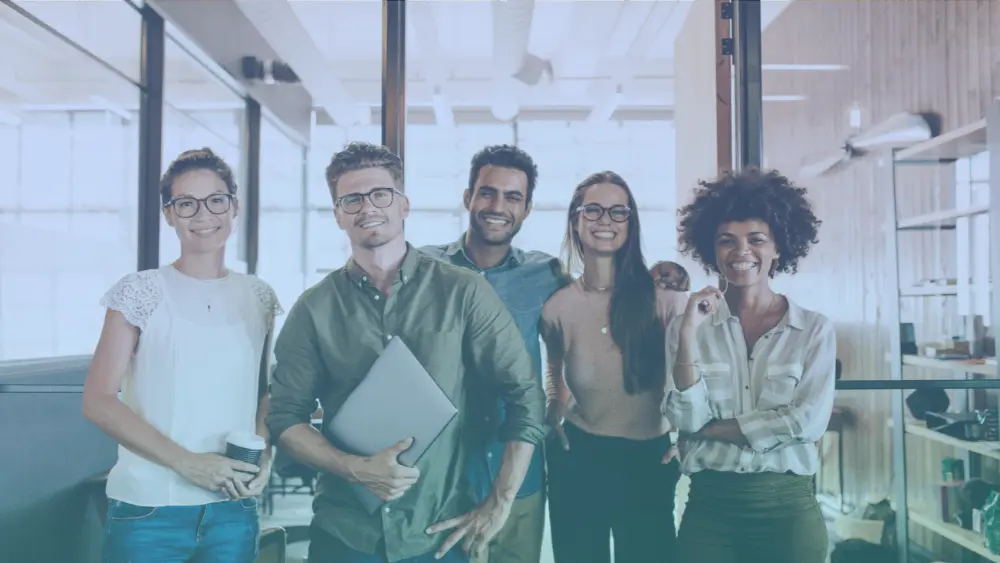Small team of five working collaboratively
